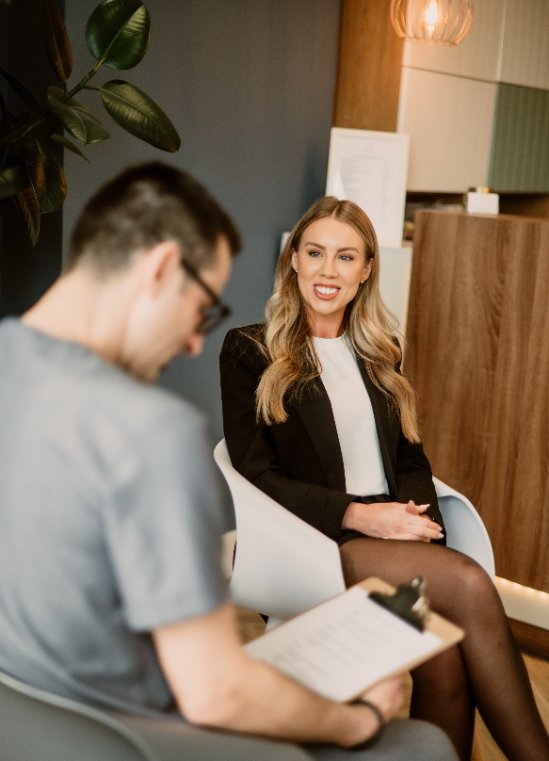 Dr Daniel Hargitai consulting with a patient at Bespoke Dental